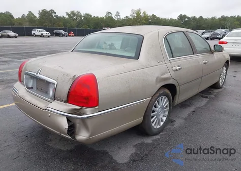 2004 Lincoln Town Car Ultimate из США, поврежденный, VIN 1LNHM83W44Y674497